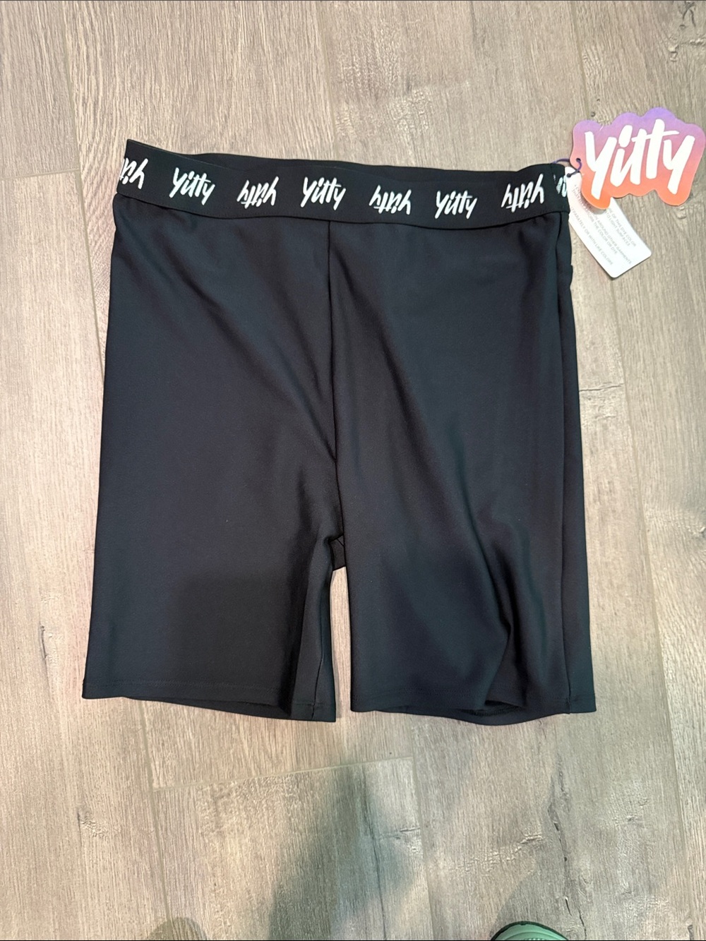 YITTY Black Logo Elastic Waist shorts.